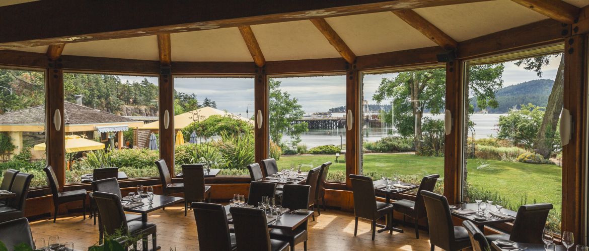 Elegant oceanfront dining setup at Atrevida Restaurant on Galiano Island